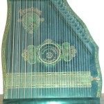 Instrument proche de la harpe, à usage privé, apparu à la fin du XIXe.